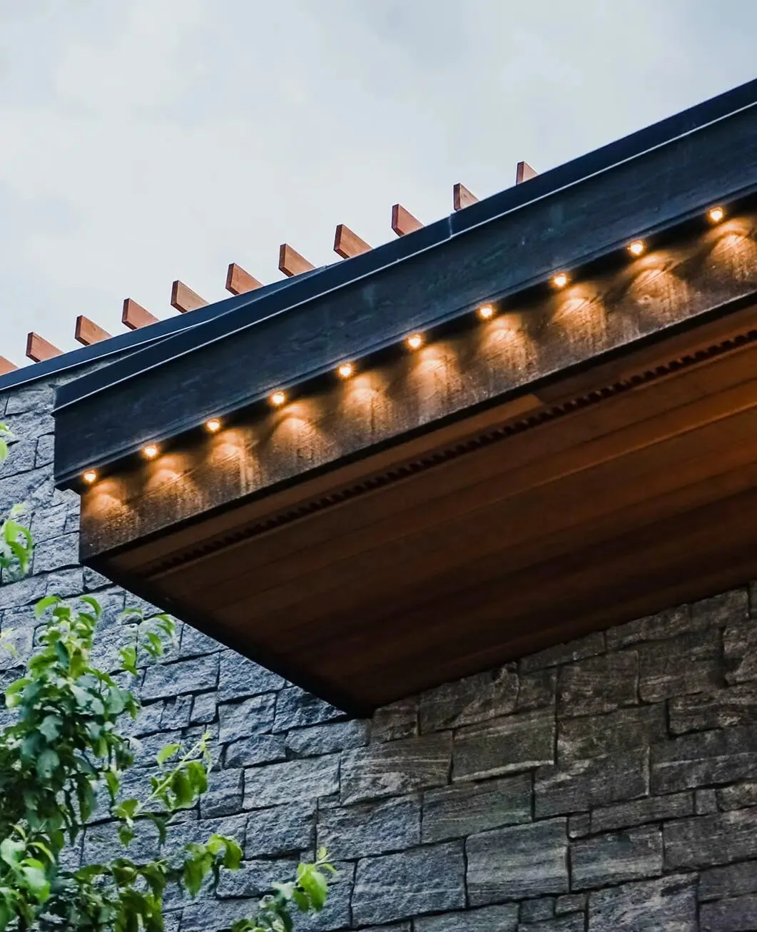 Close-up of permanent lights in a soffit track on a commercial building