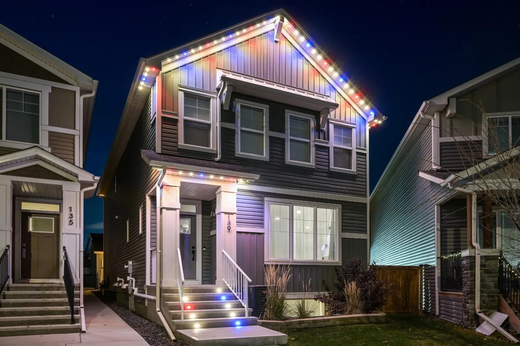 Front steps with deck lights and matching roofline lights