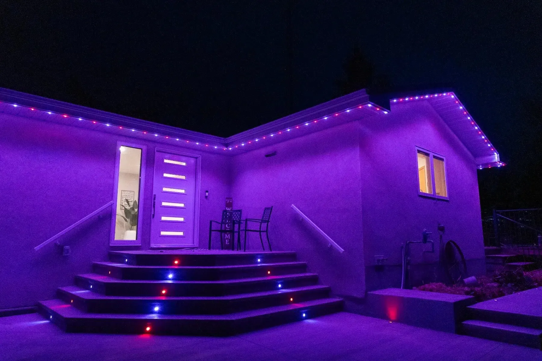 Back steps and roofline lit purple