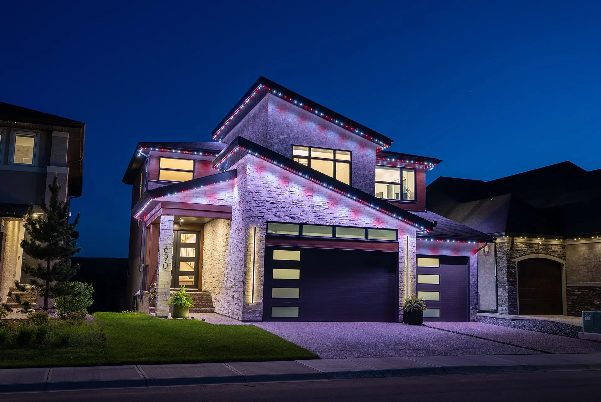 Modern home with white roofline and purple accent pattern